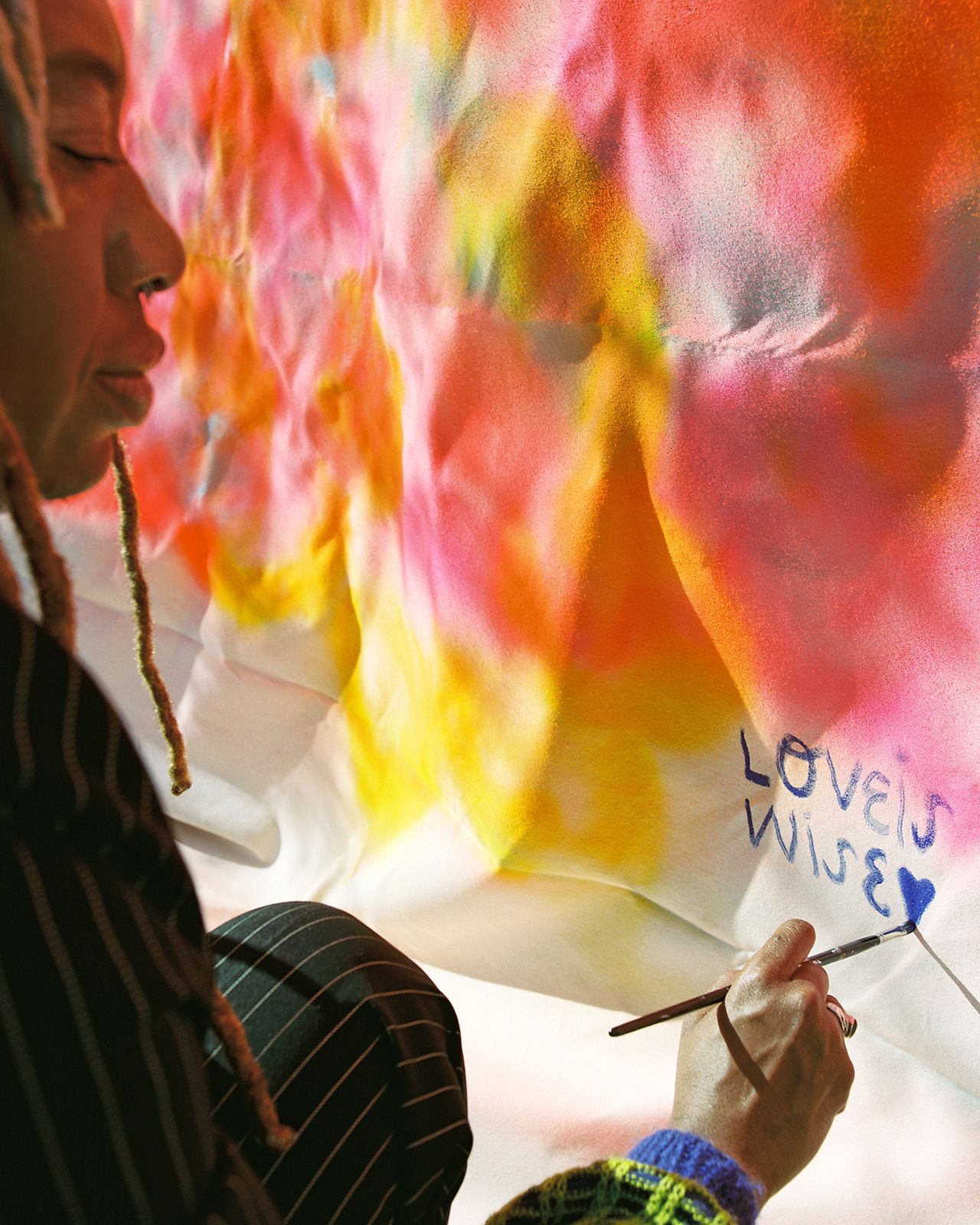 S S23 Loveis Artist Working 4x5.jpg